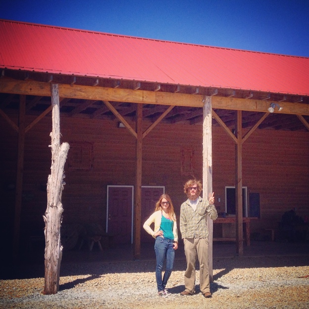 Jessica and Ray in front of the new barn at Down 2 Earth Farms.
